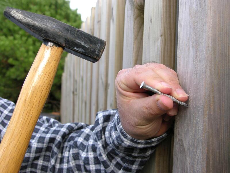 Our team at The Crawley fencing Co at work, building your fence